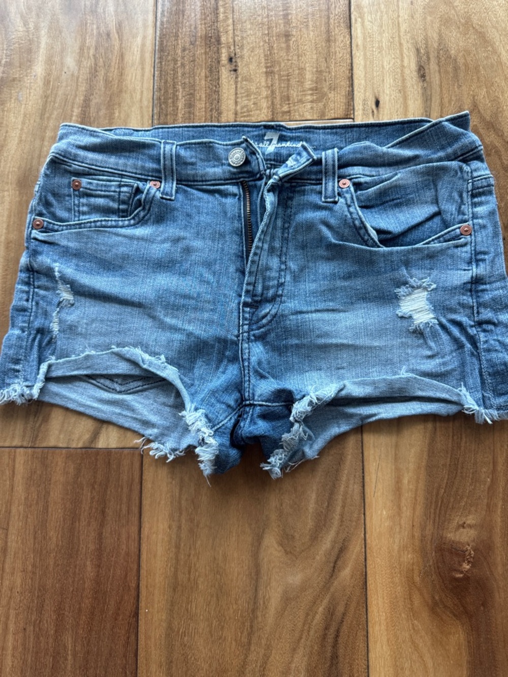 7 For All Mankind: Frayed Hem Distressed Jean Shorts - Light Blue